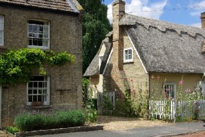 This picture shows a thatch cottage on the High Street. The High Street is within the Horningsea Conservation Area.