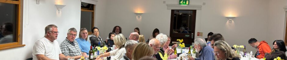 A room full of people playing bingo